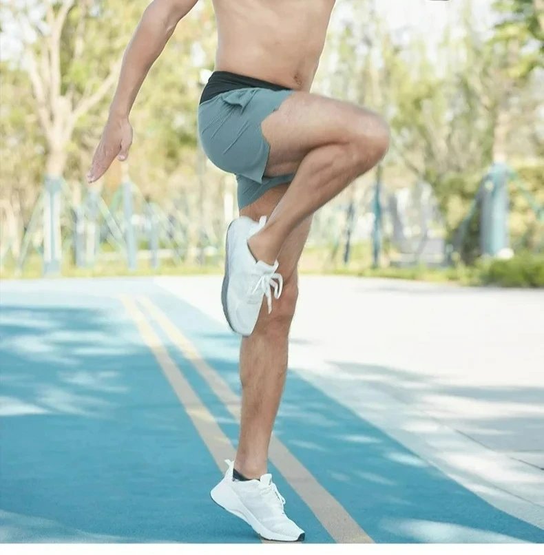 Men's 2-in-1 Triangular Lined Marathon Shorts Breathable and Quick Drying Fitness Training Men's Running Three Quarter Pants Men's 2-in-1 Triangular Lined Marathon Shorts Breathable and Quick Drying Fitness Training Men's Running Three Quarter Pants